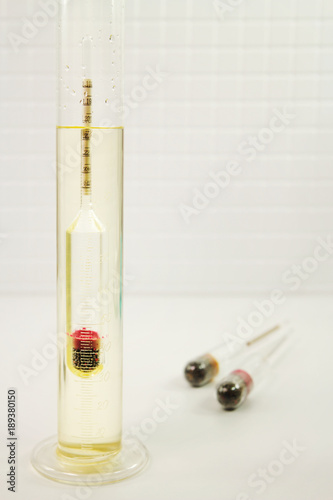 Measurement of liquid density with a hydrometer photo