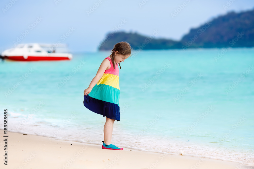 Kids on tropical beach. Children playing at sea. Kids on tropical beach. Children playing at sea.