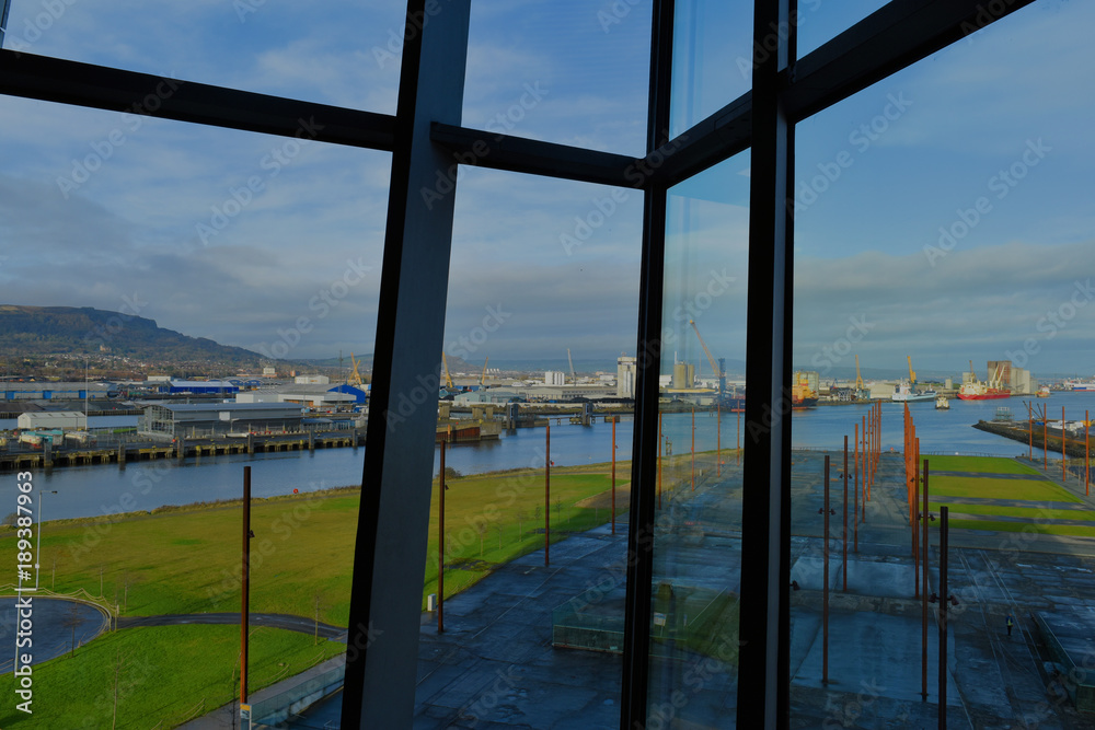 Framed window view of Titanic Dry dock area from inside museum