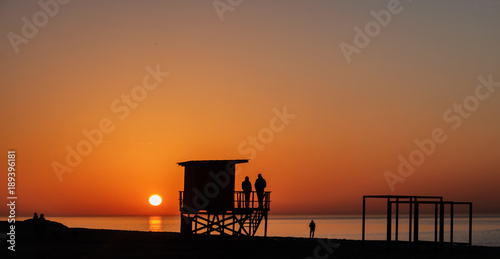  lifeguard tower silhouette on the sunset beach