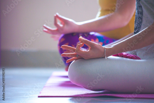 closeup of women hands in mudra gesture practice yoga indoor
