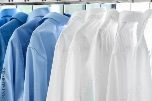 Hangers with clean shirts in laundry