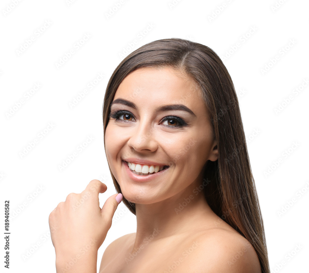 Beautiful young woman with eyelash extensions on light background Beautiful young woman with eyelash extensions on light background