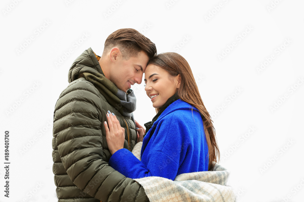 Beautiful couple in warm clothes outdoors Beautiful couple in warm clothes outdoors