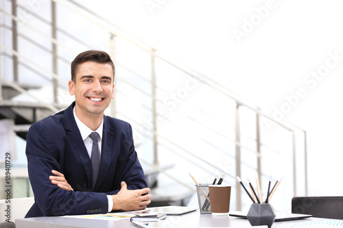 Man in elegant suit at work...