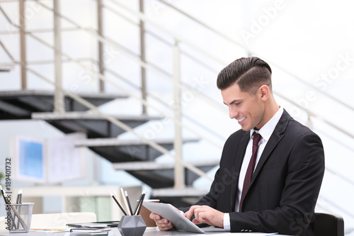 Man in elegant suit at work...