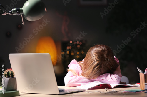 Teenage girl falling asleep...