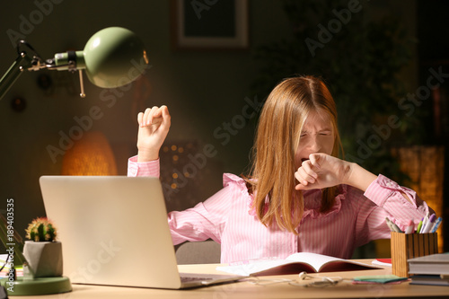 Teenage girl doing homework...