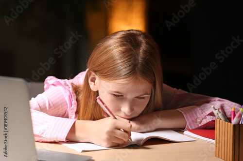 Teenage girl doing homework...