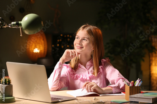 Teenage girl doing homework...