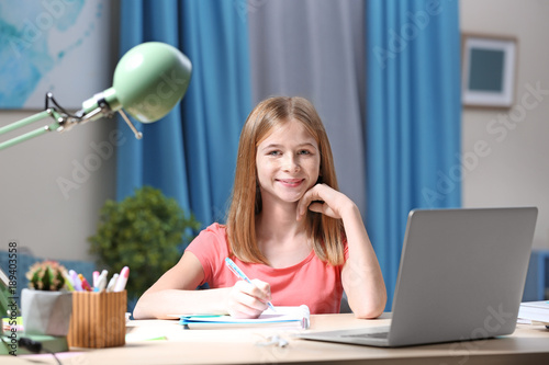 Teenage girl doing homework...
