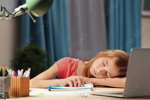 Teenage girl falling asleep...