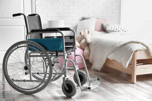 Empty wheelchair in childre...
