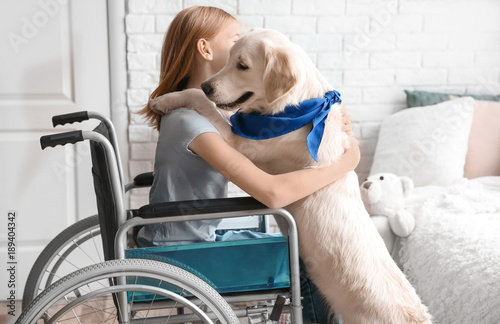 Girl in wheelchair with ser...