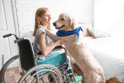 Girl in wheelchair with ser...