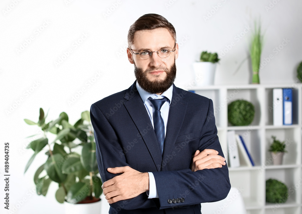 Portrait of handsome businessman indoors Portrait of handsome businessman indoors
