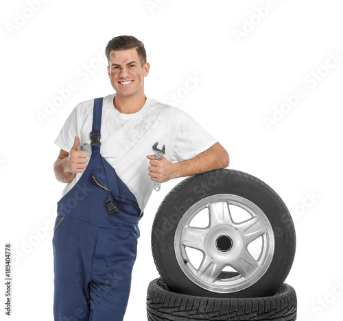 Young mechanic in uniform w...