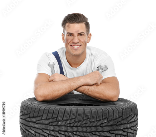 Young mechanic in uniform w...