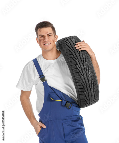 Young mechanic in uniform w...