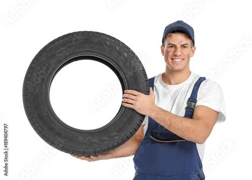 Young mechanic in uniform w...