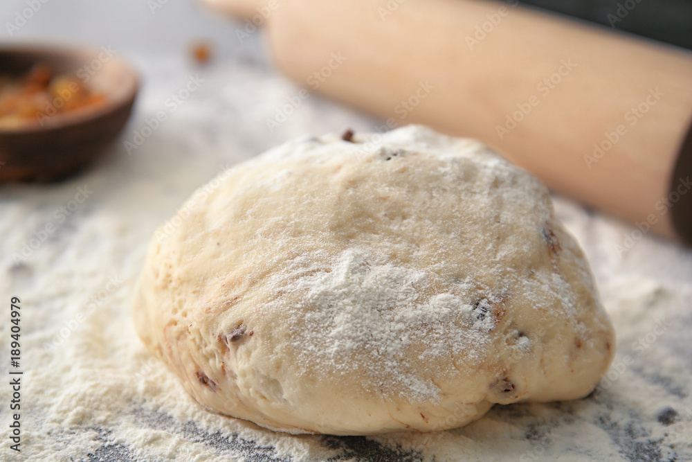 Raw dough with chocolate chips on table Raw dough with chocolate chips on table