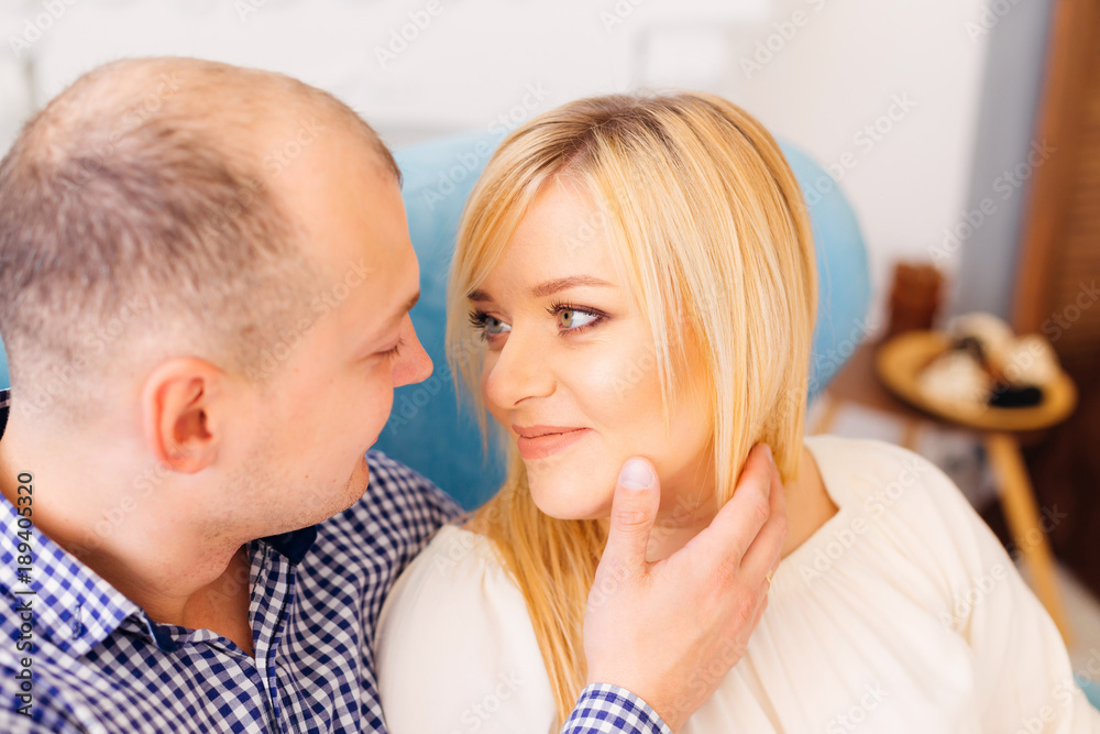a beautiful woman looking into her beloved husband's eyes a beautiful woman looking into her beloved husband's eyes