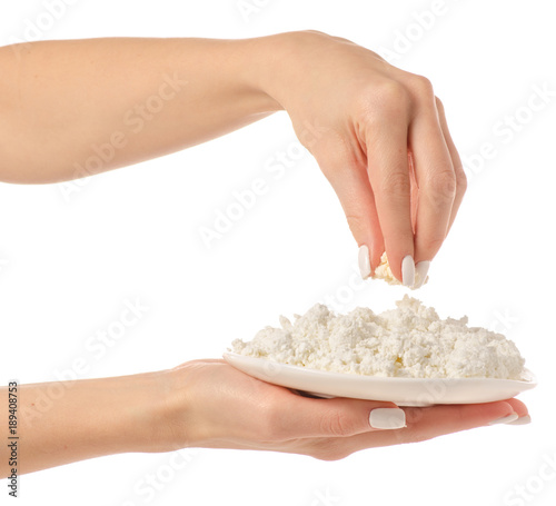 Plate of cottage cheese in hand