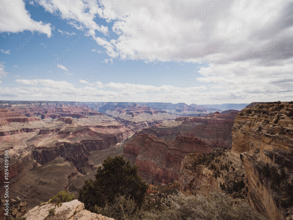 Panoramic view over Grand Canyon National Park in Arizona, USA, on a sunny and cloudy day