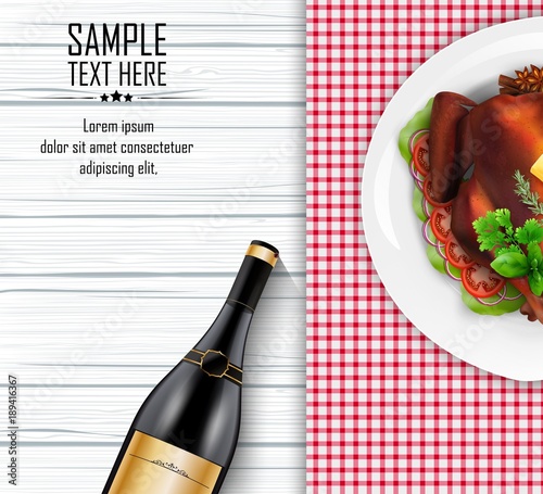 Roasted turkey bird on white plate with bottle of wine on white wooden table