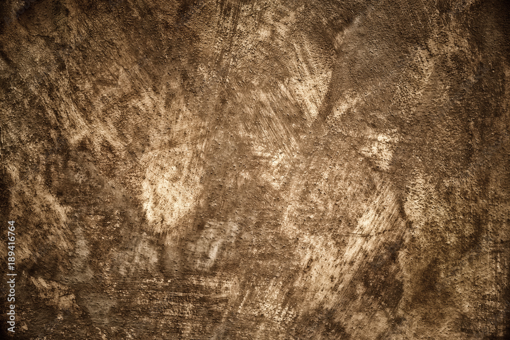 Fototapeta premium Painted concrete plaster wall background sepia vignette texture surface photo