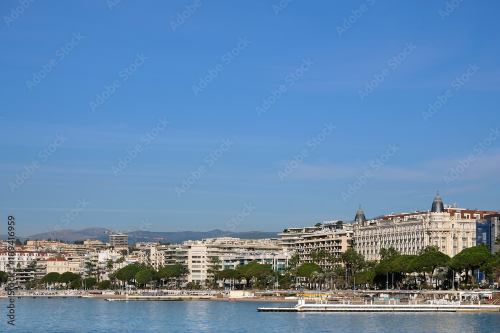 Cannes, France - view of the sea and beach in front of the Carlton International Hotel situated on the croisette boulevard in Cannes France photo