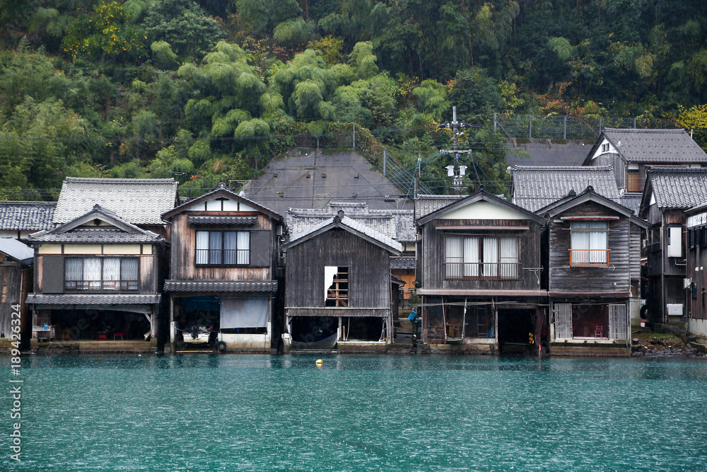 Ine Boathouse is traditional Fisherman Village on a rainy day of Kyoto, JAPAN. Ine Boathouse is traditional Fisherman Village on a rainy day of Kyoto, JAPAN.