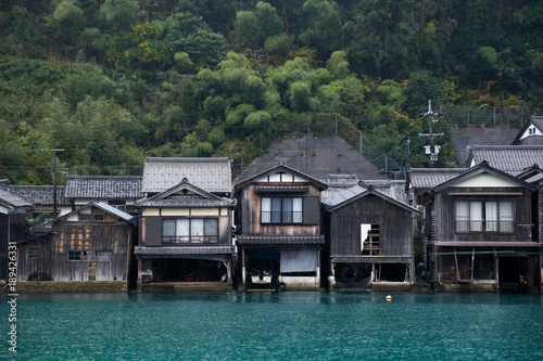 Ine Boathouse is traditional Fisherman Village on a rainy day of Kyoto, JAPAN. © saitharn