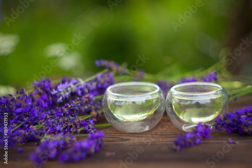 delicious green tea in  beautiful glass teapot on  table