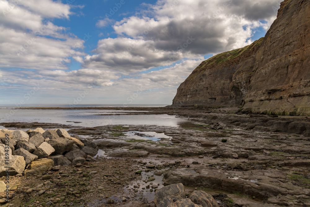 Clouds over the cliffs of Staithes, North Yorkshire, UK