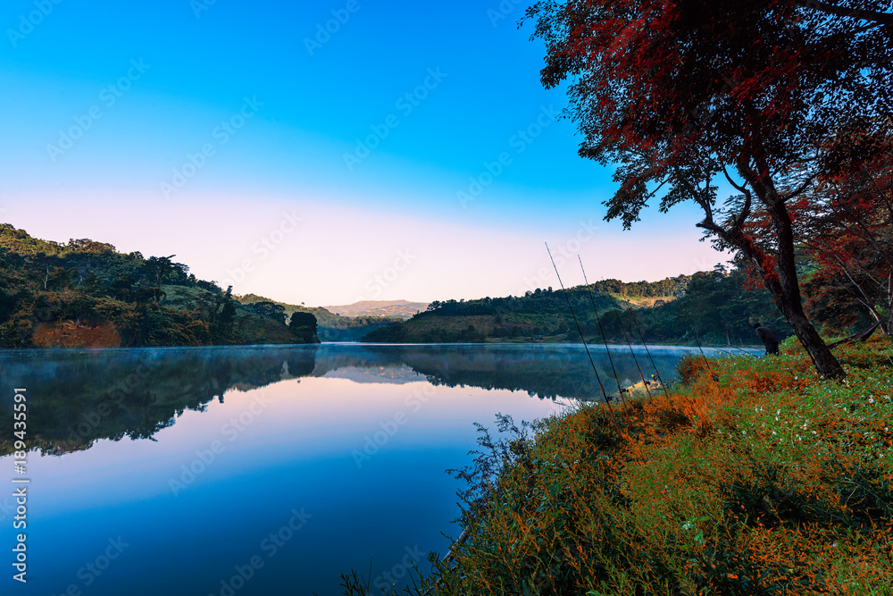Obraz premium Mae Mon Lake in Chiang Rai,Thailand at the Morning.Beautiful landscape with reflection in water.