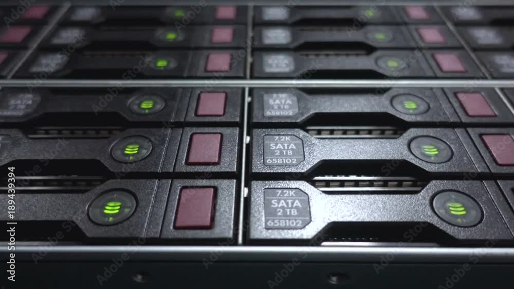 Storage HDD Server. Flashing lamp. Data servers rack with many hard drives and LED lamps flashes. Storage HDD Server. Flashing lamp. Data servers rack with many hard drives and LED lamps flashes.