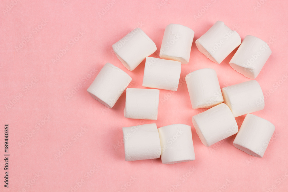 Marshmallows on pink pastel background. Marshmallows on pink pastel background.