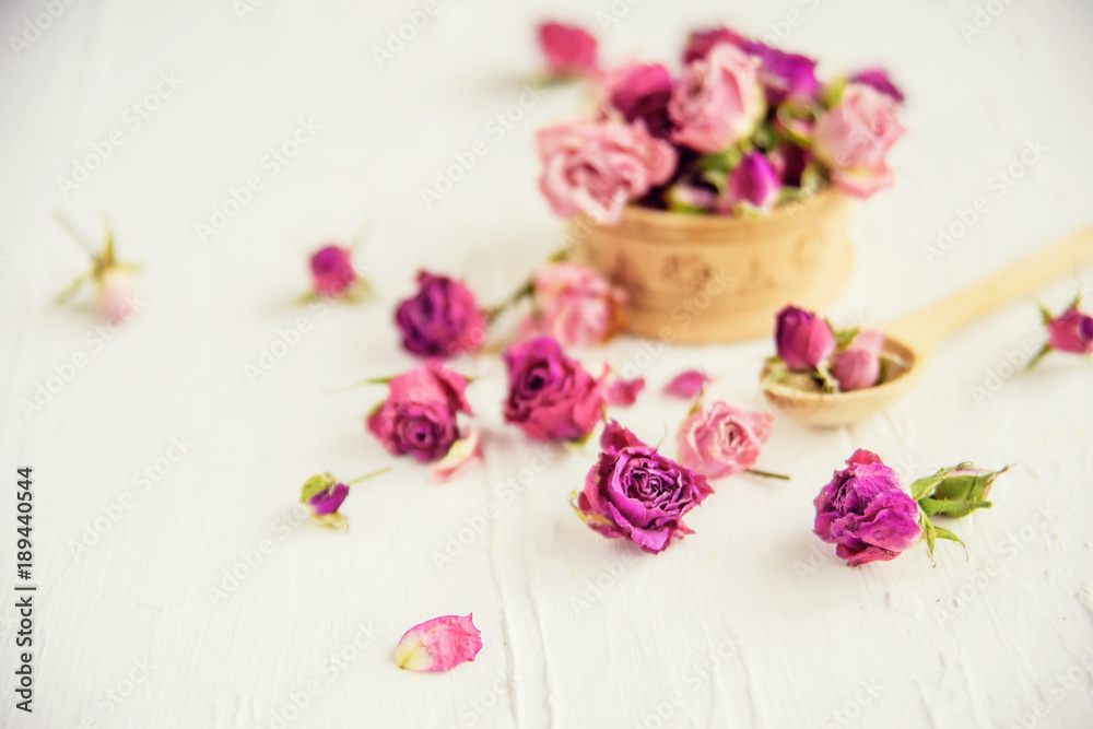 Dried rose petals: for tea, alternative medicine, pot-pourri. Copy space. Dried rose petals: for tea, alternative medicine, pot-pourri. Copy space.