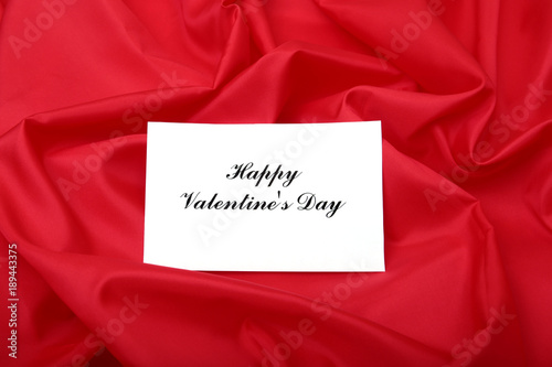 Valentine's day background with gift box and greeting card.