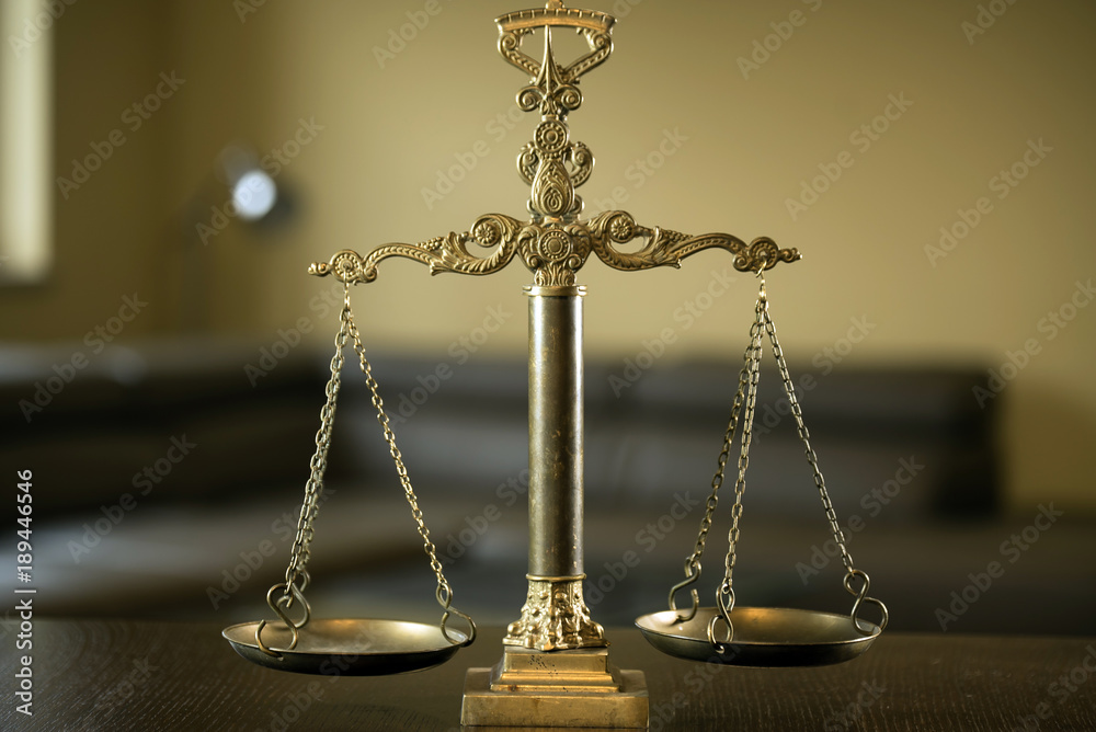 Law and Justice concept. Mallet of the judge, books, scales of justice.  Courtroom theme.