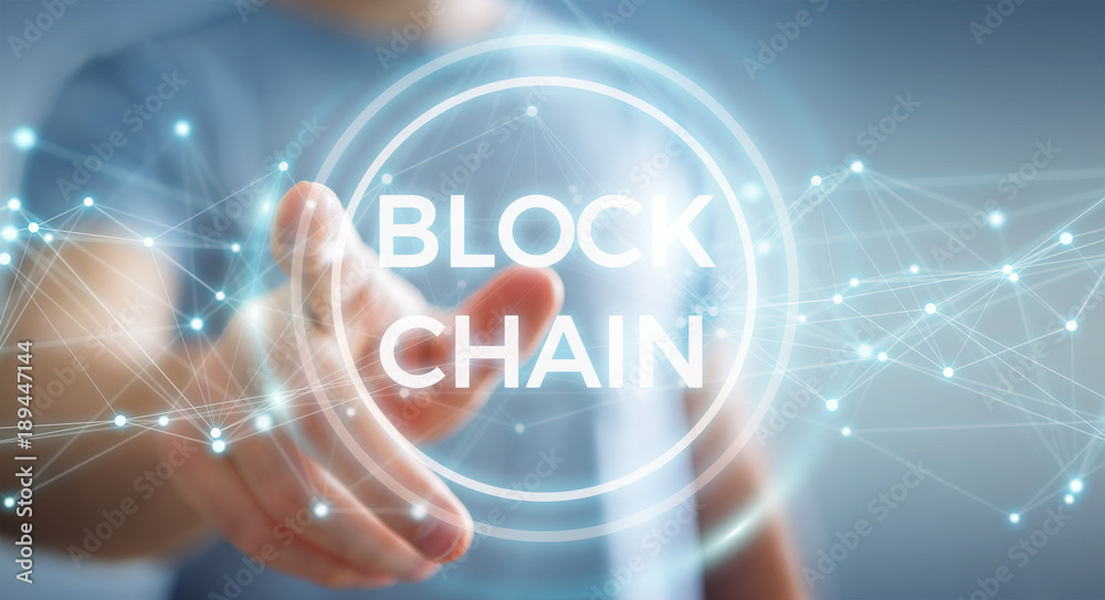 Businessman using blockchain cryptocurrency interface 3D rendering Businessman using blockchain cryptocurrency interface 3D rendering