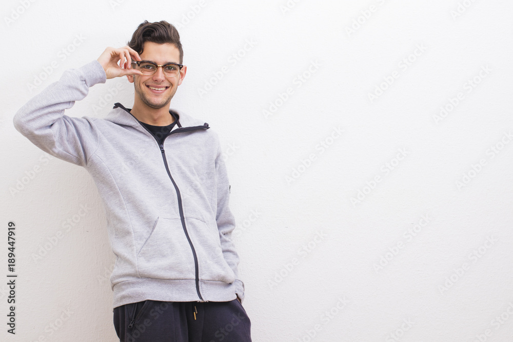young casual style on the white wall young casual style on the white wall