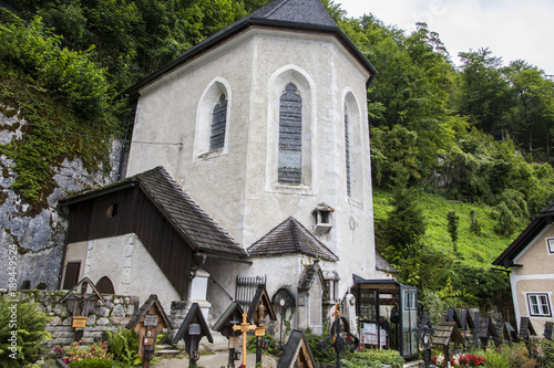 The Charnel House (Beinhaus) and the cemetery of the Catholic Church of the Assumption in Hallstatt, Salzkammergut, Austria photo