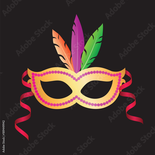 Carnival mask with colorful feathers on a black background.