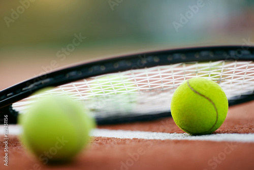 Sport. Tennis Balls And Racket On Court