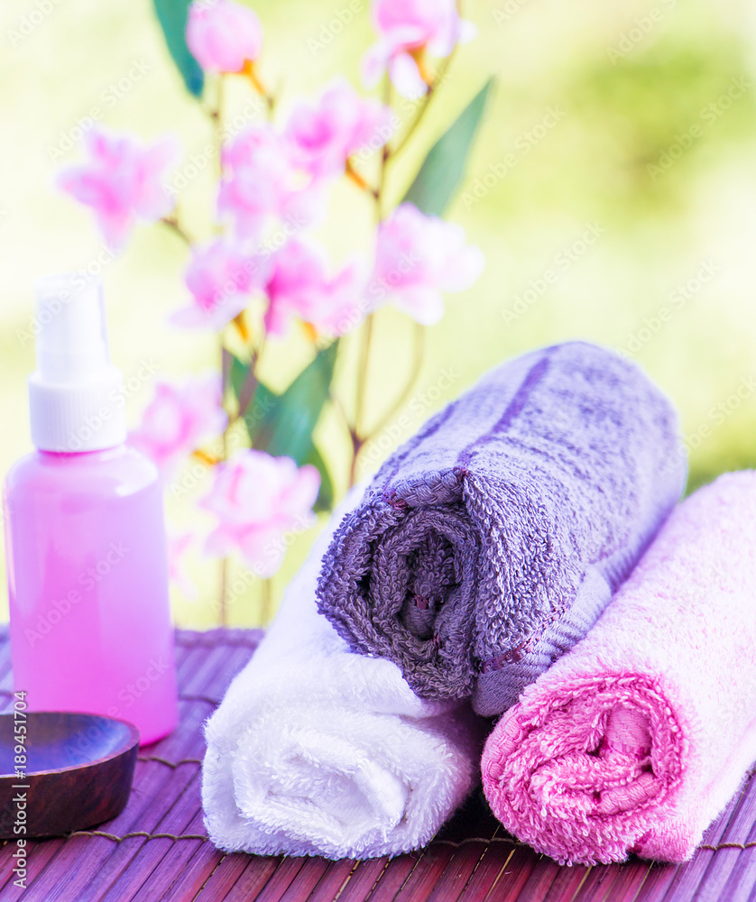 Exotic Therapy Composition Including Towels Oil and Flowers Exotic Therapy Composition Including Towels Oil and Flowers