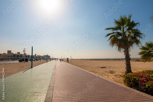 Beach in Dubai on sunny day. Burj Al Arab in background © johnkruger1