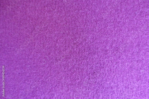 Simple fuchsia colored knitted fabric from above