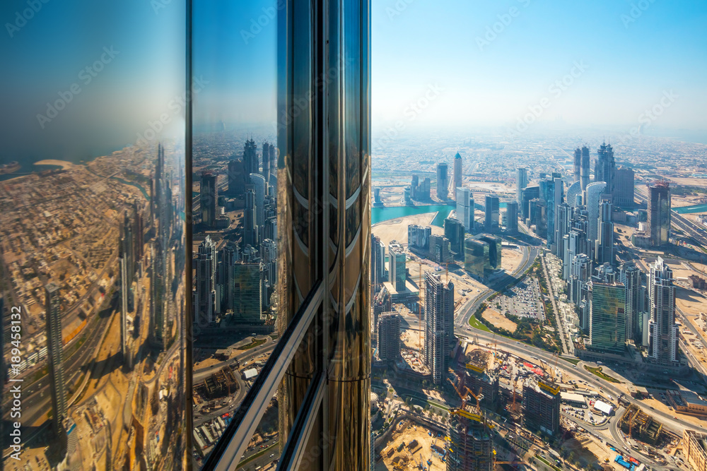 Obraz premium Skyscrapers on Sheikh Zayed Road in Dubai, UAE. View of Downtown Dubai from the observation desk of Burj Khalifa.